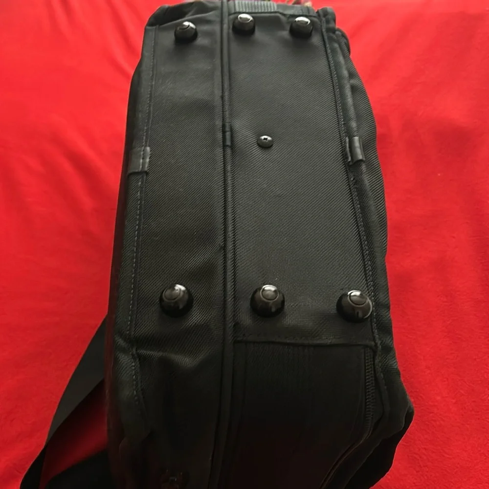 Tumi Black brief case/messenger bag